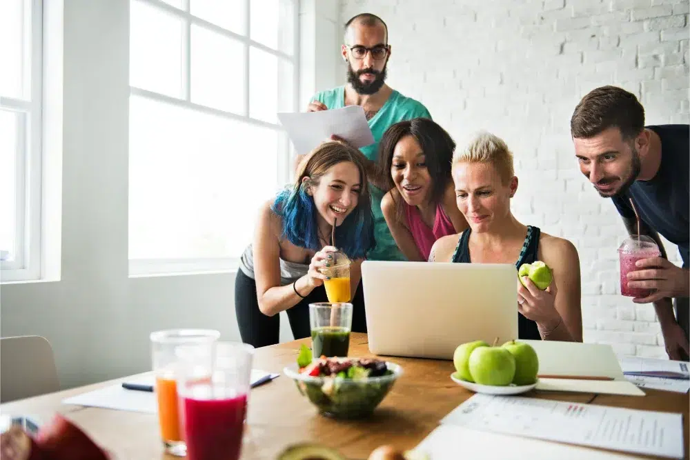 group healthy employees is using laptop at work what is group health insurance what is group health insurance
