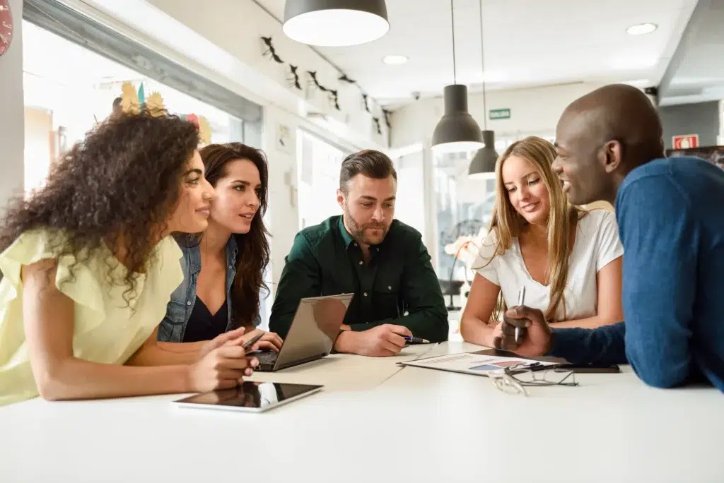 employees discussing group savings options 1 Group Retirement Savings